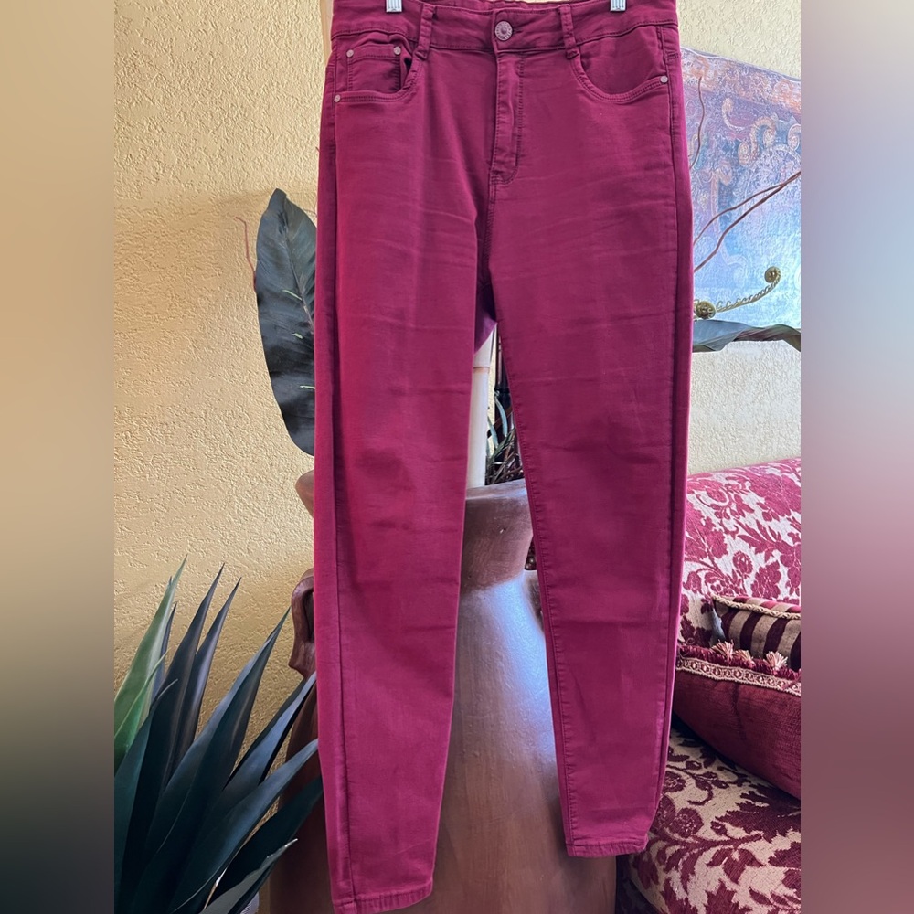 Burgundy color Jean, great material stretches and comes back, size 14.